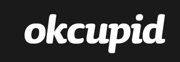 OkCupid logo - okcupid in lowercase cursive in white on a black background. | QueerDoc hookup
