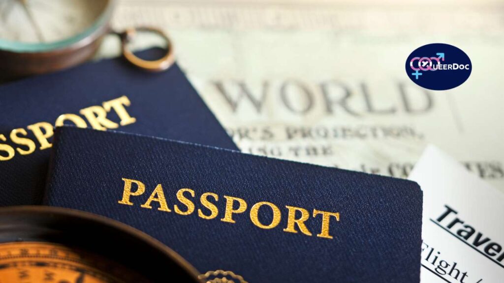 A photo of two passports, compass and travel documents with the QueerDoc logo to represent the importance of legal transition for transgender and gender diverse community.